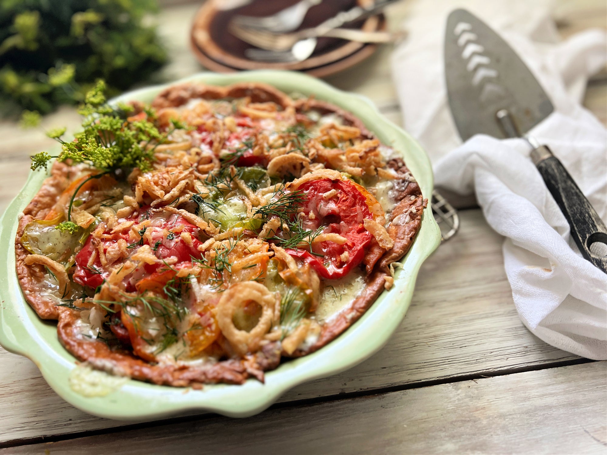 When it comes to must-haves in the summertime, tomato pie is right up there at the top for us. 